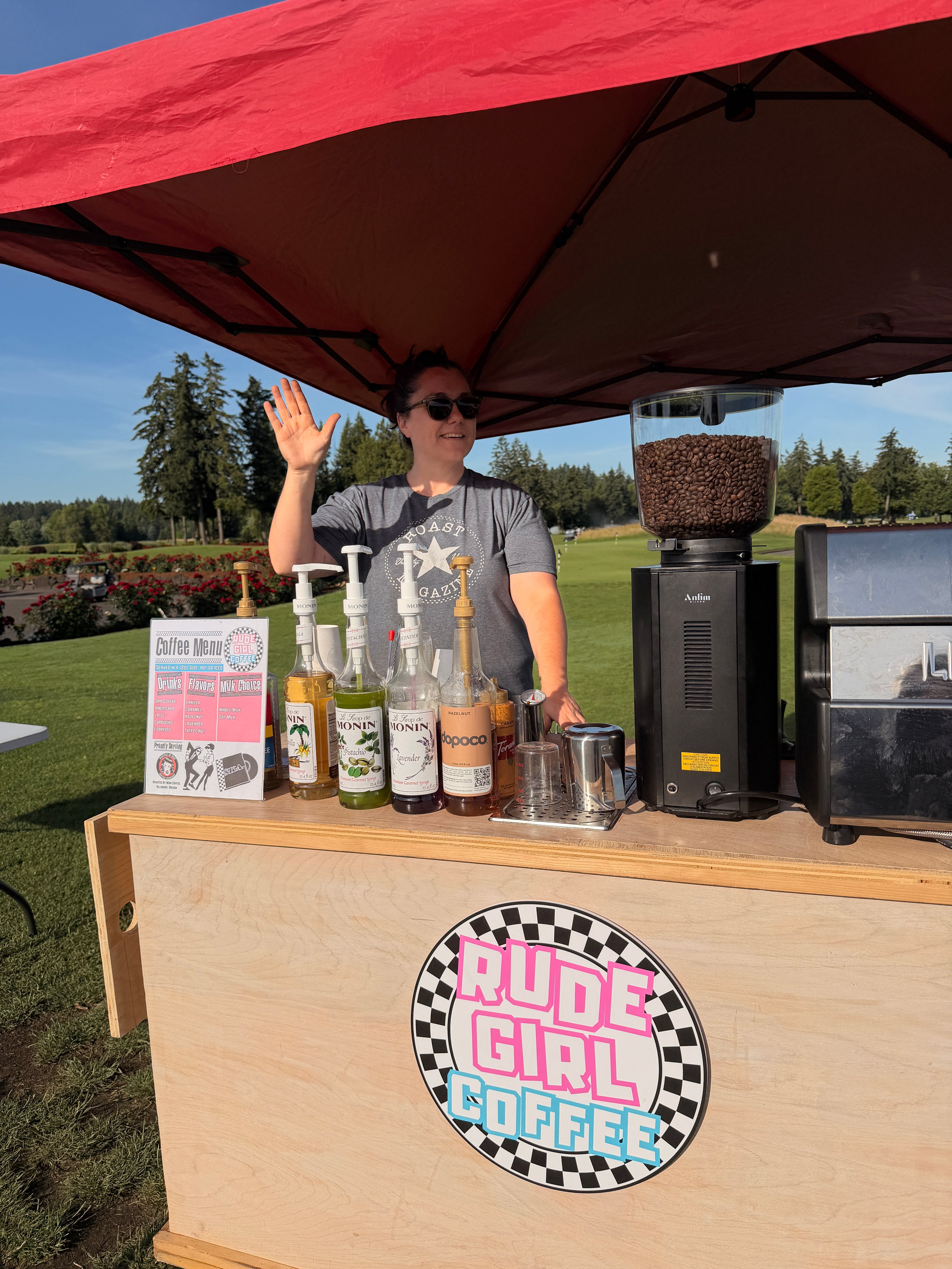 Barista standing behind coffee cart - rude girl coffee hillsboro oregon
